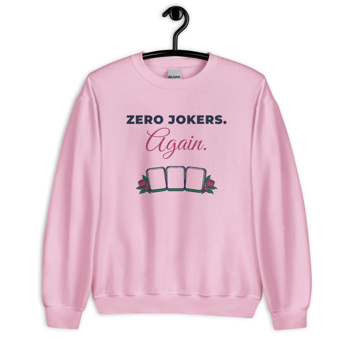 Zero Jokers. Again. Crewneck in Light Pink on a hanger