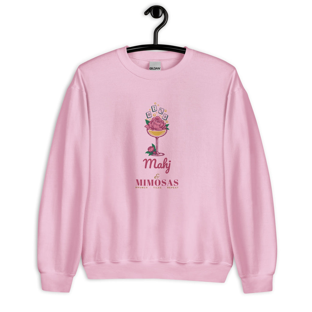 Mahj & Mimosas Crewneck in Light Pink on a hanger