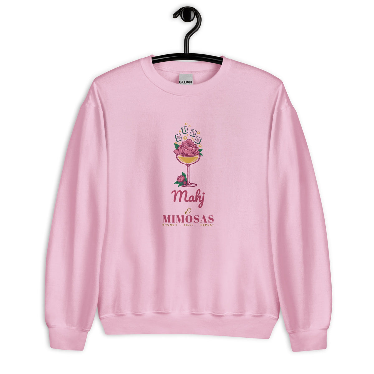 Mahj & Mimosas Crewneck in Light Pink on a hanger