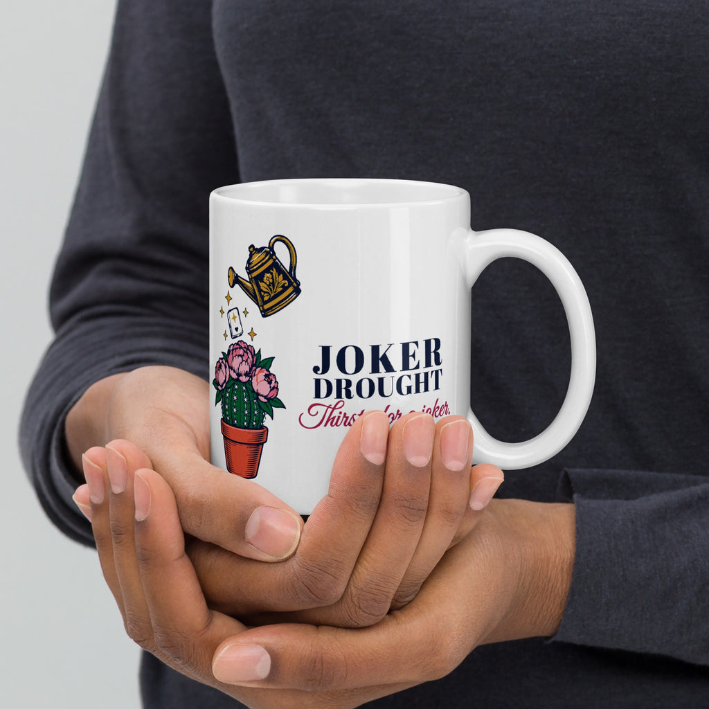 Hands holding the Thirsty for a Joker Joker Drought cactus mahjong mug, 11 oz white glossy