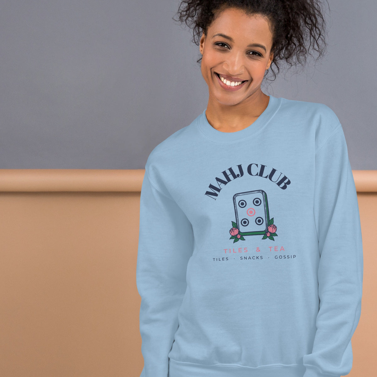 Woman wearing the Mahj Club Crewneck in Light Blue