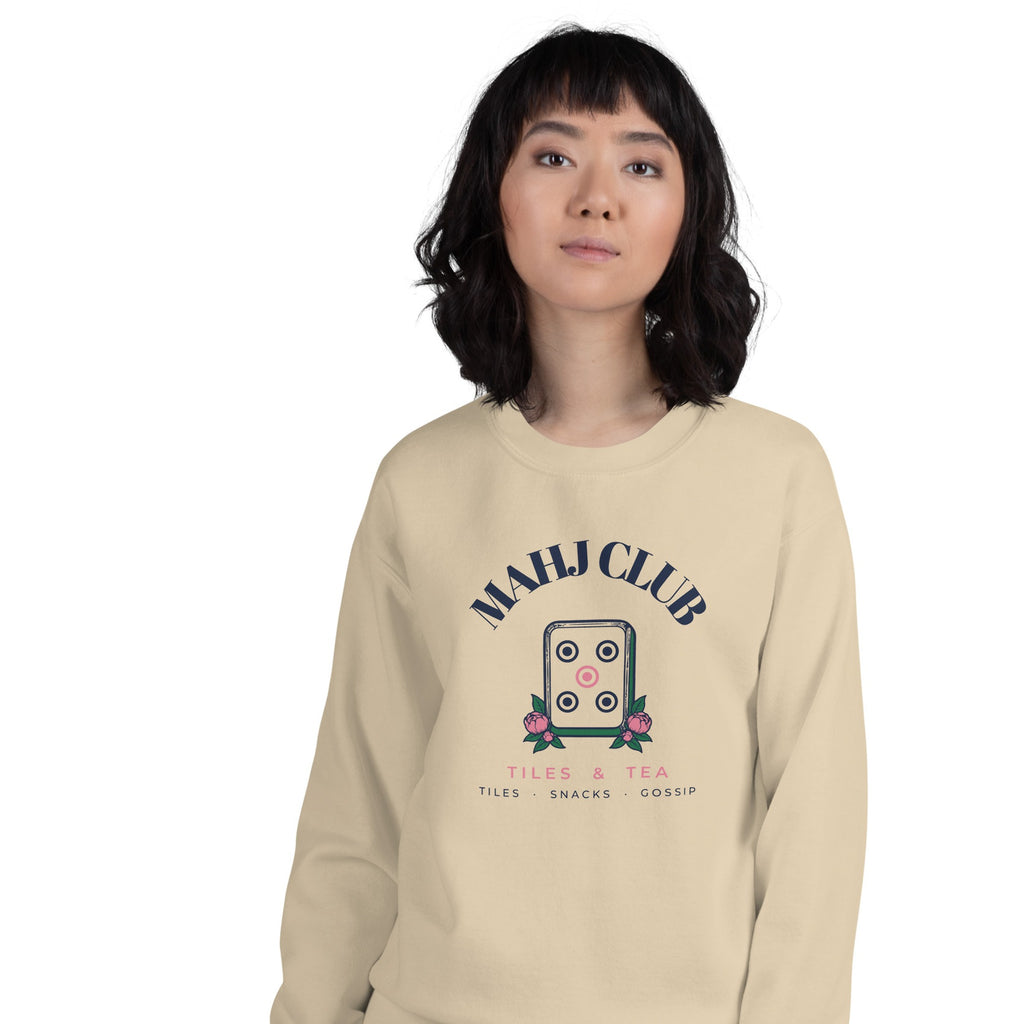Woman wearing the Mahj Club Crewneck in Sand