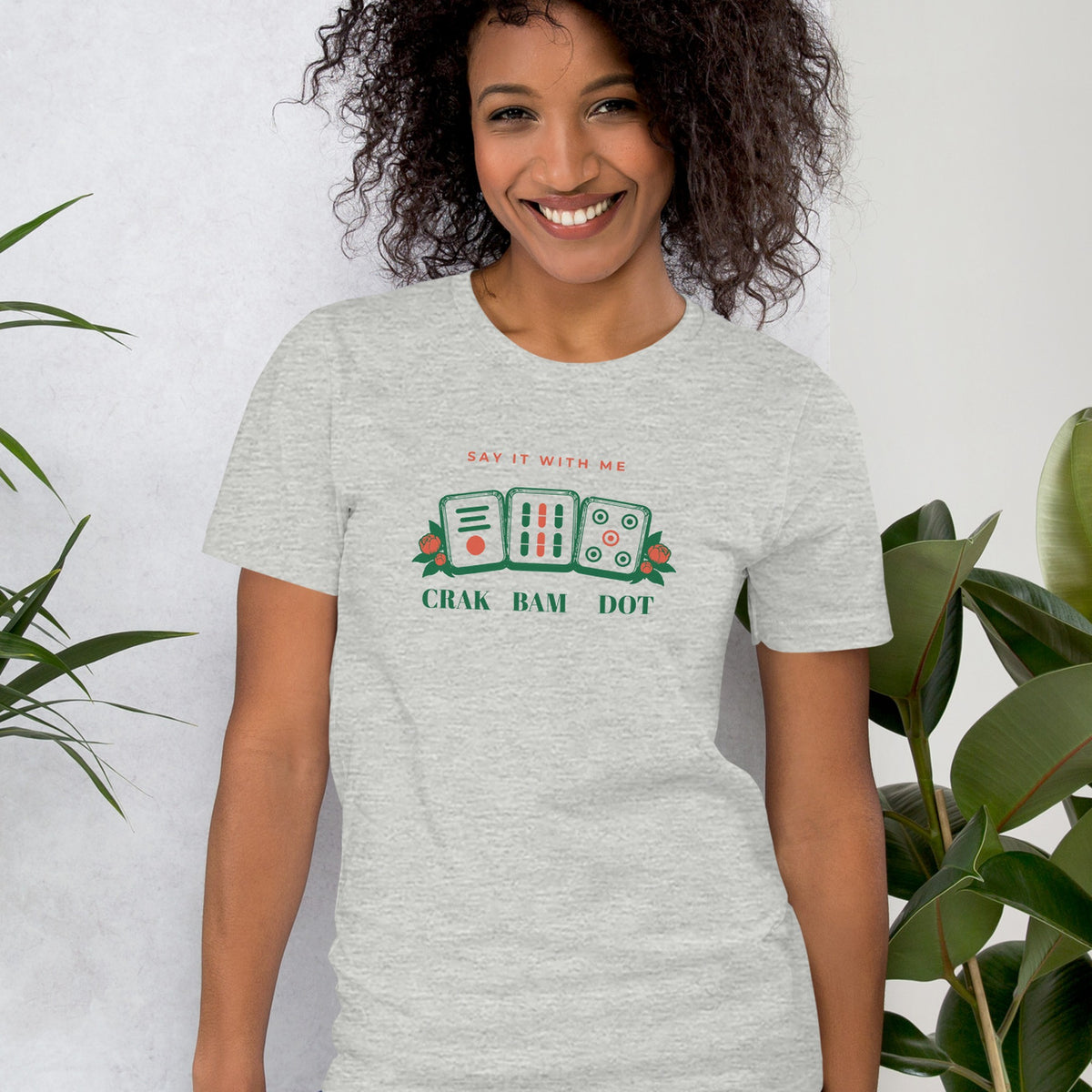 Woman wearing the Crak Bam Dot Tee in Athletic Heather
