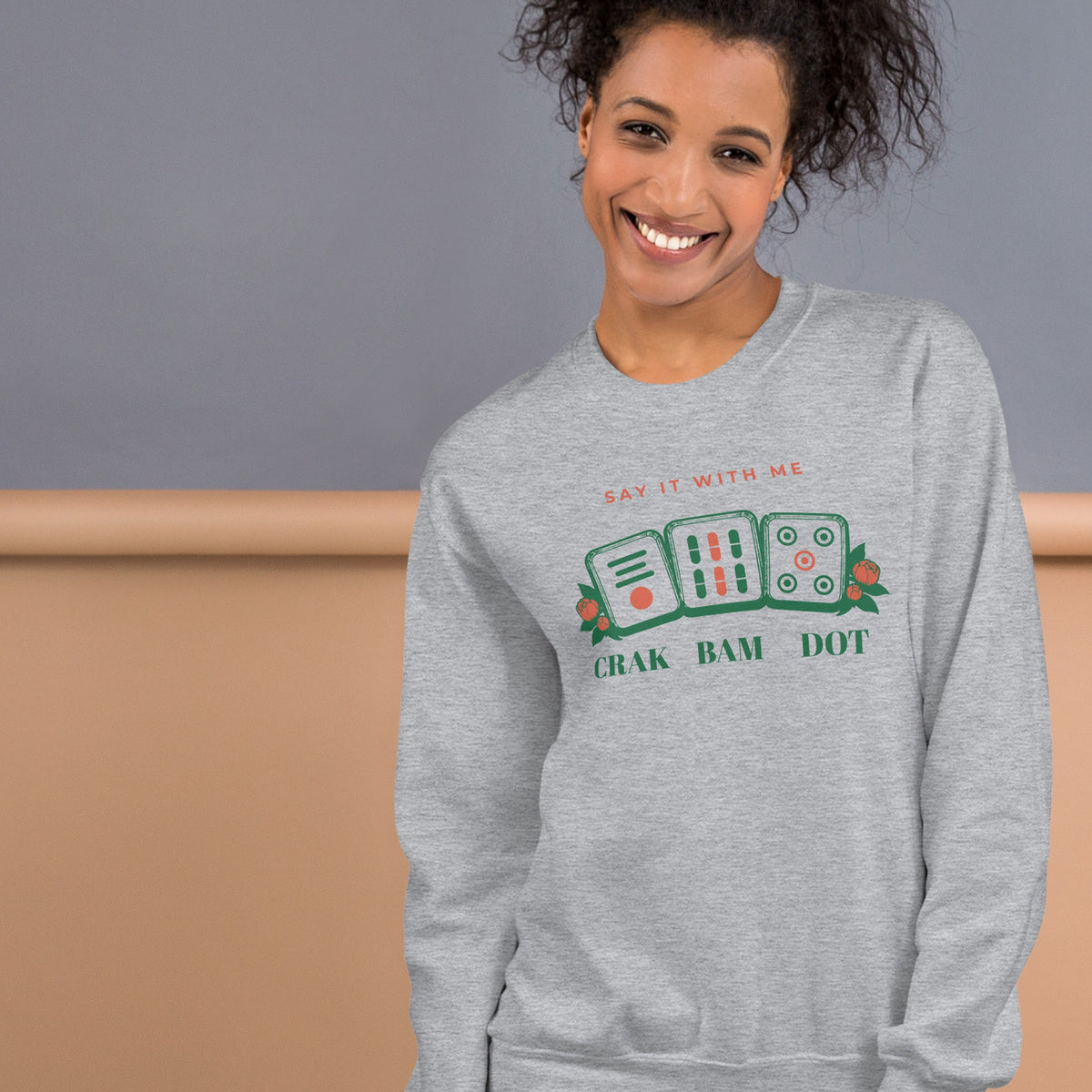 Woman wearing the Crak Bam Dot Sweatshirt in Sport Grey