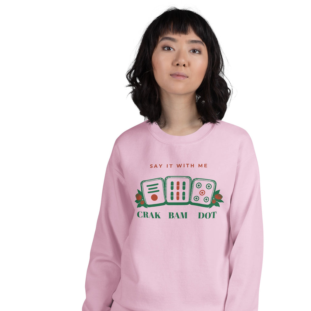 Woman wearing the Crak Bam Dot Sweatshirt in Light Pink