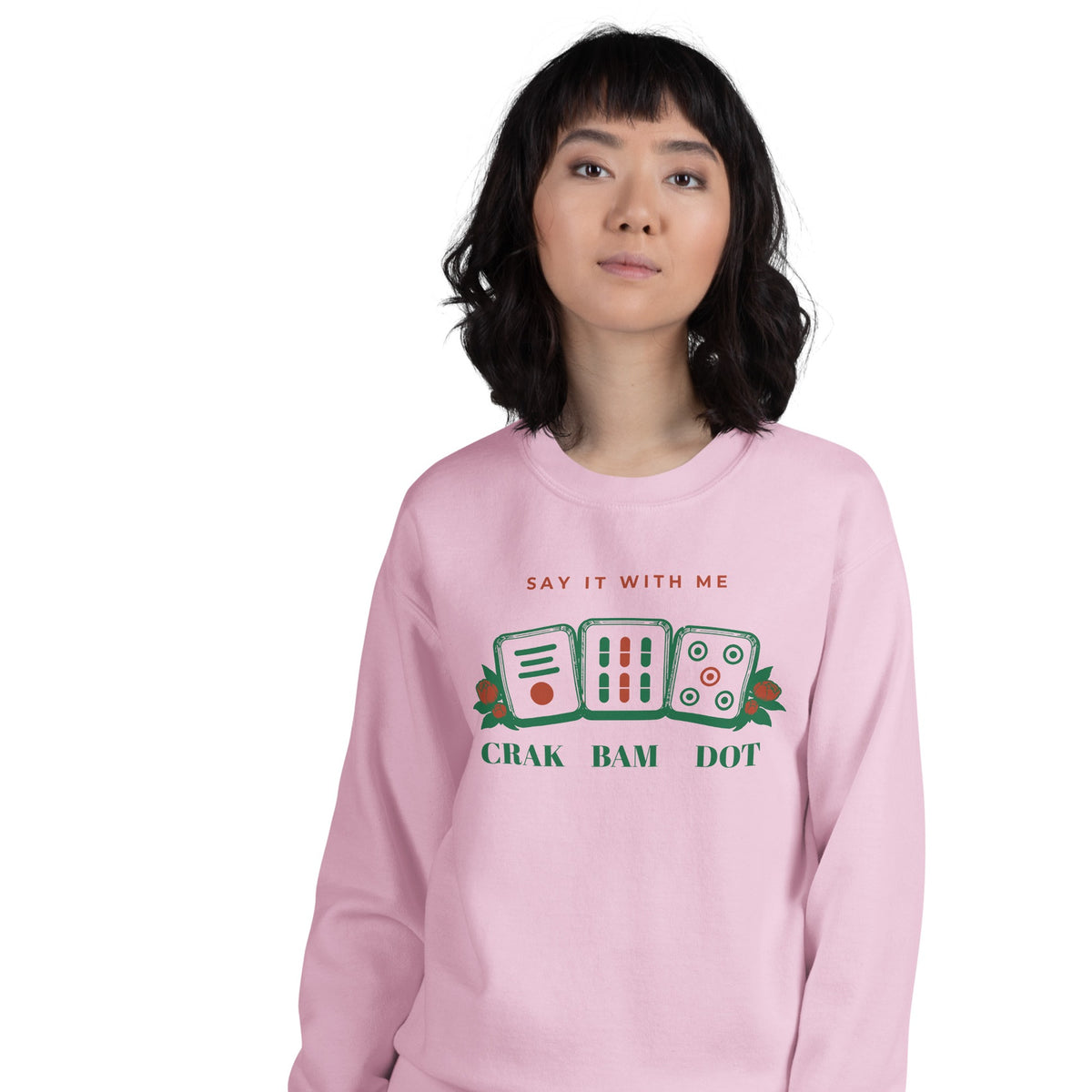 Woman wearing the Crak Bam Dot Sweatshirt in Light Pink
