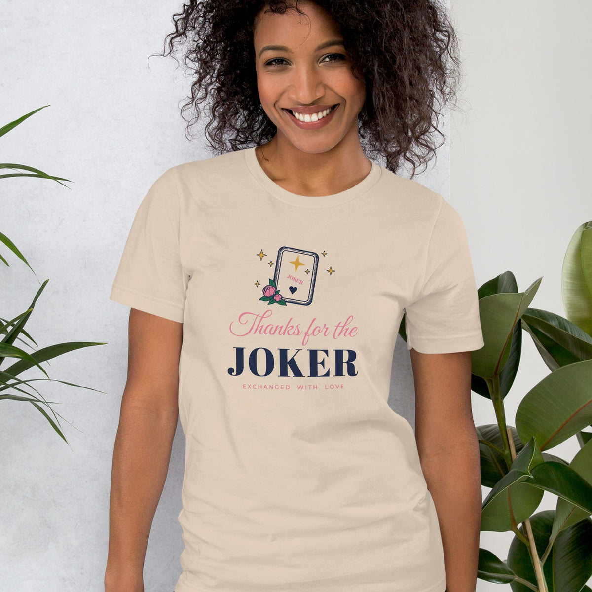 Woman wearing the Thanks for the Joker Tee in Soft Cream