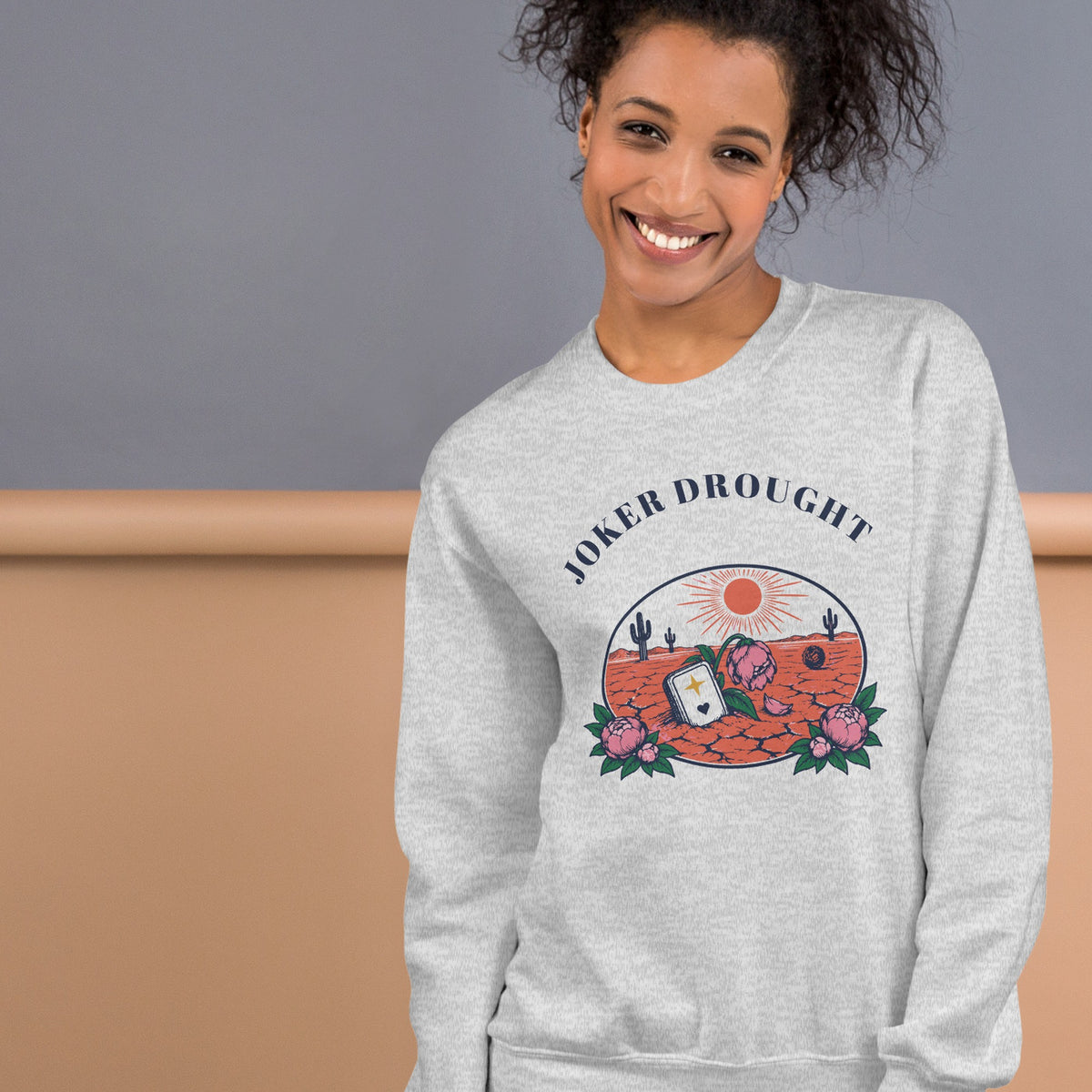 Woman wearing the Joker Drought Desert Relic Crewneck in Ash