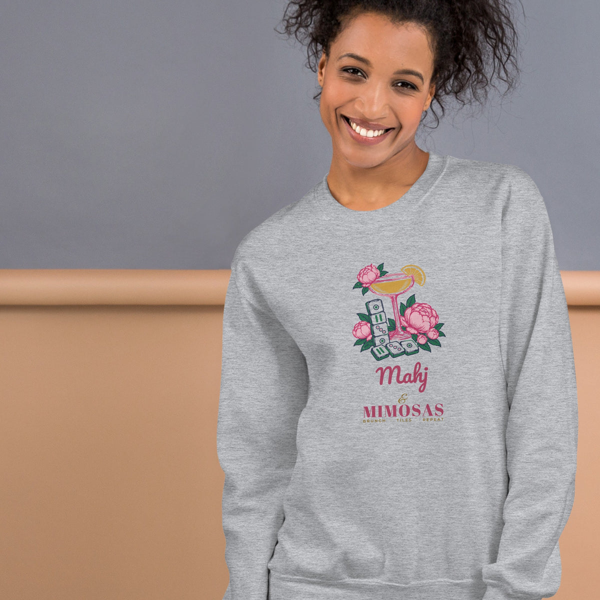 Woman wearing the Mahj & Mimosas Crewneck in Sport Grey