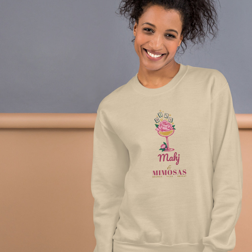 Woman wearing the Mahj & Mimosas Crewneck in Sand